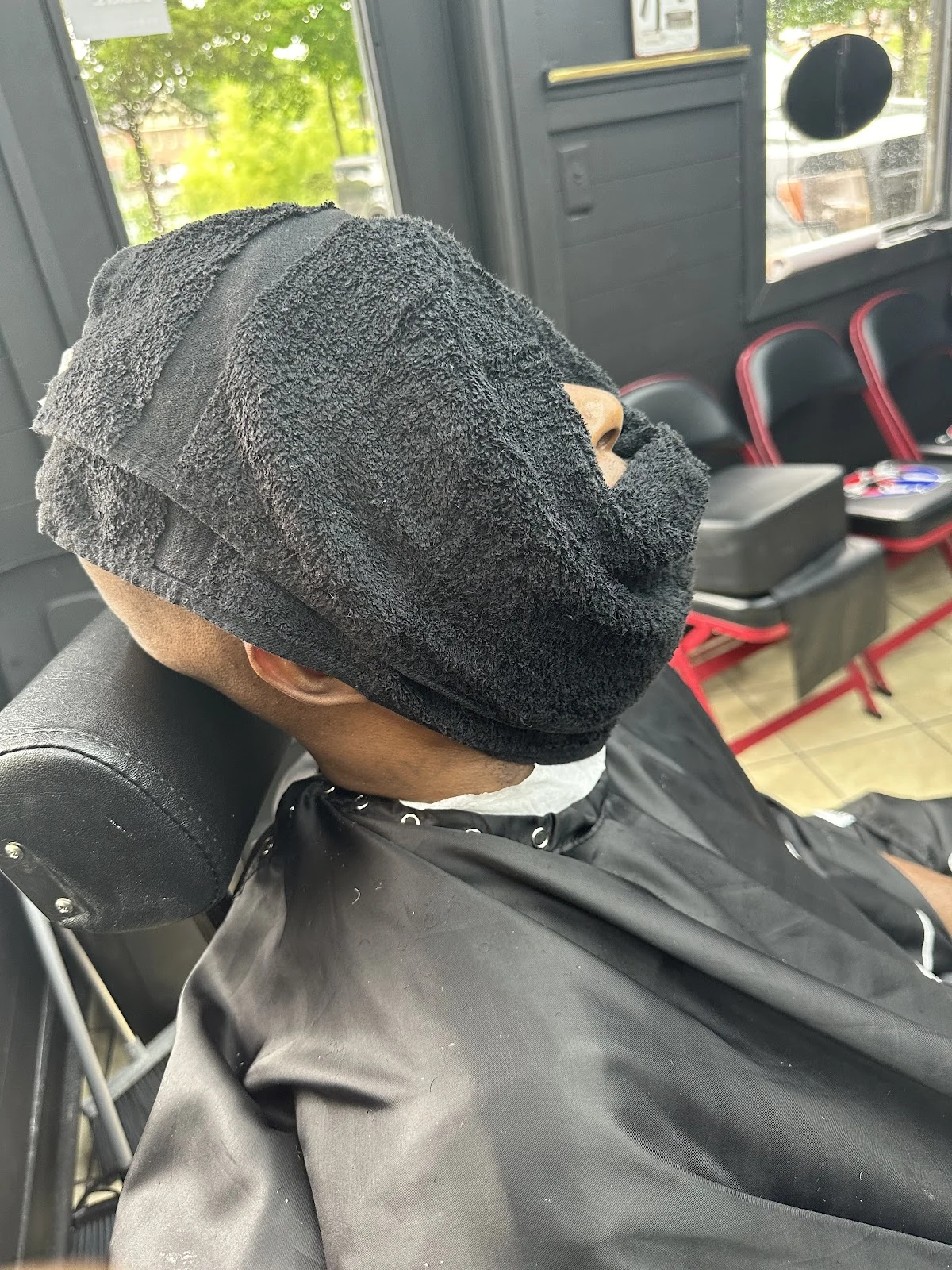 Inside Fades and Blades Grooming — barber chairs and waiting area